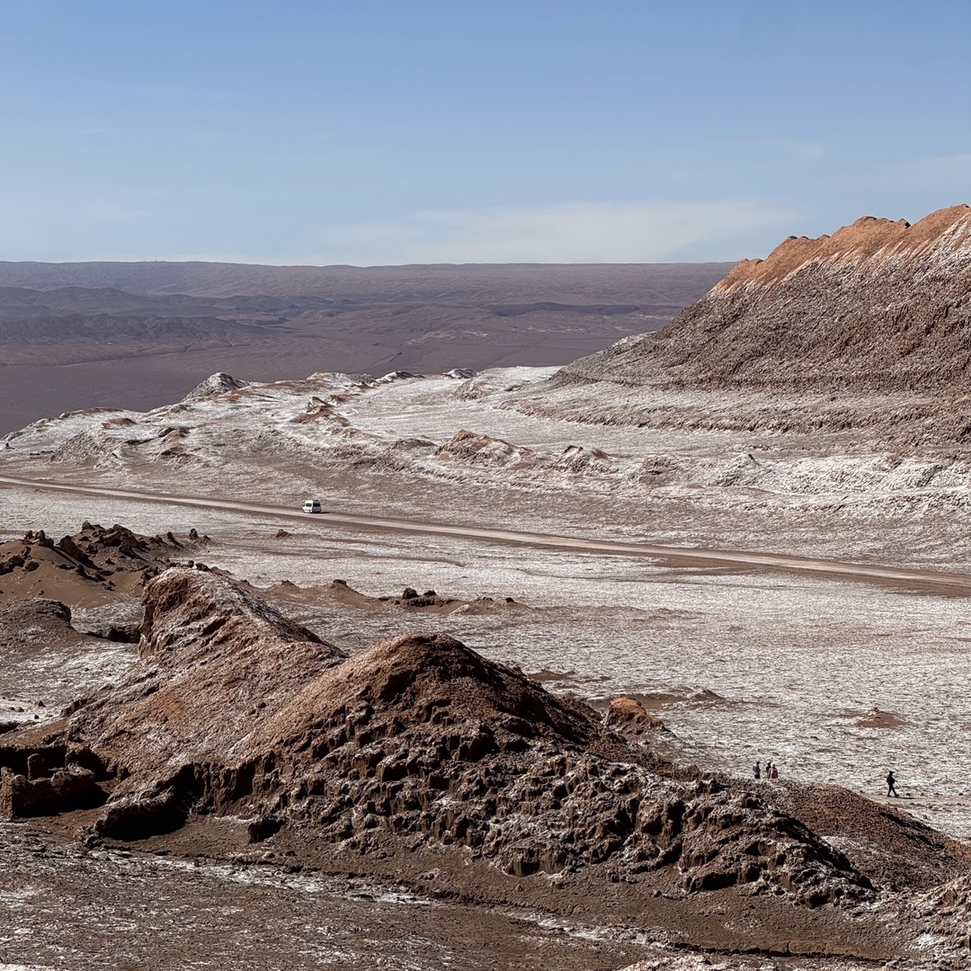 Pale salt deposits and layered rock in Valle de la Luna, Chile
