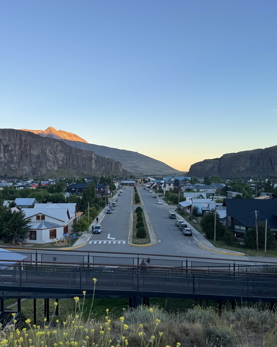 El Chaltén's main avenue and the mountains at dusk